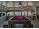 Entertaining game room features a pool table, providing a fun space for recreation and socializing at 5730 Imperial Ky, Tampa, FL 33615