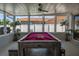 Entertaining game room features a pool table, providing a fun space for recreation and socializing at 5730 Imperial Ky, Tampa, FL 33615