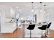 Elegant kitchen features white cabinets, granite countertops, and stainless steel appliances at 5730 Imperial Ky, Tampa, FL 33615