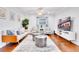 Inviting living room features hardwood floors and modern furnishings, perfect for relaxation at 5730 Imperial Ky, Tampa, FL 33615
