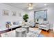 Bright living room with a neutral color palette, stylish decor, and hardwood floors at 5730 Imperial Ky, Tampa, FL 33615