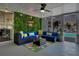 Cozy patio with comfortable seating, lush greenery, and vibrant decor for outdoor enjoyment at 5730 Imperial Ky, Tampa, FL 33615