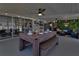 Spacious patio with dining area, grill, comfortable seating, perfect for outdoor entertaining at 5730 Imperial Ky, Tampa, FL 33615