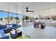 Inviting screened patio with dining and seating areas overlooking the pool at 5730 Imperial Ky, Tampa, FL 33615