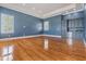 Spacious bonus room with hardwood floors, recessed lighting, and wet bar area at 650 Geneva Pl, Tampa, FL 33606