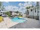 Inviting backyard pool surrounded by a paver patio, perfect for relaxation and entertainment at 650 Geneva Pl, Tampa, FL 33606