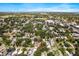 Panoramic aerial view shows the property and neighborhood with a mix of residential and commercial areas at 716 35Th W St, Bradenton, FL 34205