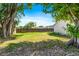 Spacious backyard with ample room for recreational activities and gardening at 716 35Th W St, Bradenton, FL 34205