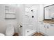 This bathroom features a shower, wooden floors, and a granite countertop sink at 716 35Th W St, Bradenton, FL 34205