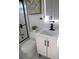 Modern bathroom with a new vanity, black hardware, and a sleek, updated design for a contemporary feel at 8274 Rose Ter, Seminole, FL 33777