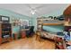 room featuring built-in bunk beds, a window, and a desk with computer at 945 Winding Oaks Dr, Palm Harbor, FL 34683