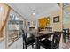Cozy dining area with a view of the backyard at 945 Winding Oaks Dr, Palm Harbor, FL 34683