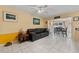 A view of the living area featuring the couch, window, and decor at 945 Winding Oaks Dr, Palm Harbor, FL 34683