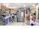 Functional kitchen featuring stainless refrigerator and ample storage space at 10044 Oana St, New Port Richey, FL 34654