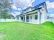 Beautiful backyard with a well-manicured lawn, perfect for outdoor activities and relaxation on a sunny day at 1015 W Charter St, Tampa, FL 33602