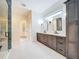 Elegant bathroom with double vanity, modern fixtures, and spacious walk-in shower at 1015 W Charter St, Tampa, FL 33602