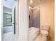 Bathroom showcasing a tub/shower combo and modern fixtures and finishes at 1015 W Charter St, Tampa, FL 33602