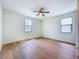 Well-lit bedroom featuring hardwood floors and bright windows at 1015 W Charter St, Tampa, FL 33602