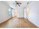 Bright bedroom with hardwood floors, neutral paint and white trim at 1015 W Charter St, Tampa, FL 33602