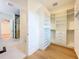 Organized walk-in closet with custom shelving and drawers, providing ample storage space at 1015 W Charter St, Tampa, FL 33602