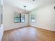 Dining room features hardwood floors, contemporary lighting, and backyard views at 1015 W Charter St, Tampa, FL 33602