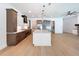 Modern kitchen with a central island, stainless steel appliances, and stylish pendant lights at 1015 W Charter St, Tampa, FL 33602