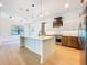 Modern kitchen featuring an island, stainless steel appliances, and stylish pendant lighting at 1015 W Charter St, Tampa, FL 33602