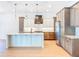 Stylish kitchen with modern appliances, an island, and elegant pendant lighting at 1015 W Charter St, Tampa, FL 33602