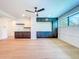 Bright living room with custom cabinets, hardwood floors, and large windows at 1015 W Charter St, Tampa, FL 33602