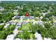 Aerial view of the neighborhood, highlighting the location with a red pin and surrounding trees at 1015 W Charter St, Tampa, FL 33602