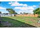 Large backyard with a wooden fence and a shed at 1029 Madison St, Largo, FL 33770
