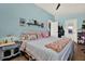 Cozy bedroom with light blue walls, a comfortable bed, and ample closet space at 1029 Madison St, Largo, FL 33770