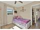 Charming bedroom featuring a trundle bed, plenty of sunlight, and a cozy, welcoming atmosphere at 1029 Madison St, Largo, FL 33770