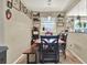 Cozy dining room featuring a rustic wood table, bench seating, and charming decor at 1029 Madison St, Largo, FL 33770