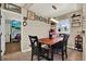 Charming dining space with rustic table and decor, connecting to a living area at 1029 Madison St, Largo, FL 33770