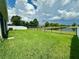 Enjoy the tranquility of this fenced backyard, complete with views of a pond at 10621 Scenic Hollow Dr, Riverview, FL 33578