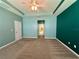Open view of a primary bedroom including access to the bathroom and walk-in closet at 10621 Scenic Hollow Dr, Riverview, FL 33578