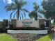 Community entrance sign adorned with lush landscaping, welcoming you to Riverview Meadows at 10621 Scenic Hollow Dr, Riverview, FL 33578