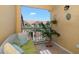 Relaxing balcony offers a cushioned seat, views of the grounds, and a tranquil outdoor space at 10764 70Th Ave # 4305, Seminole, FL 33772