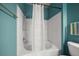 Bathroom featuring a shower-tub combo with tile surround and wall niche at 10764 70Th Ave # 4305, Seminole, FL 33772