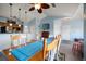 Inviting dining room with a ceiling fan, with a view into the kitchen at 10764 70Th Ave # 4305, Seminole, FL 33772