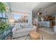 Bright living room with comfortable seating, natural light, and inviting decor at 10764 70Th Ave # 4305, Seminole, FL 33772