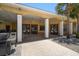 Outdoor patio and eating area featuring multiple tables and chairs with tile floors at 10764 70Th Ave # 4305, Seminole, FL 33772