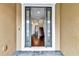 Spacious foyer with gleaming hardwood floors and a view of the staircase at 11613 Sweet Tangerine Ln, Tampa, FL 33626