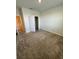Bedroom with neutral carpet and closet at 11634 Woodleaf Dr, Bradenton, FL 34211