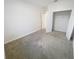 Cozy bedroom with plush carpeting and a spacious walk-in closet at 11634 Woodleaf Dr, Bradenton, FL 34211