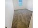 Bright, carpeted bedroom with a window offering natural light at 11634 Woodleaf Dr, Bradenton, FL 34211