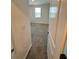 Bedroom with carpet and view of lake at 11634 Woodleaf Dr, Bradenton, FL 34211