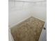 Carpeted walk-in closet designed to maximize storage and organization at 11634 Woodleaf Dr, Bradenton, FL 34211