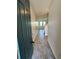 Welcoming entryway boasting sleek tile flooring and ample natural light at 11634 Woodleaf Dr, Bradenton, FL 34211